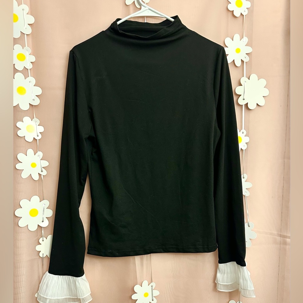 Black Top with White Ruffle Cuffs